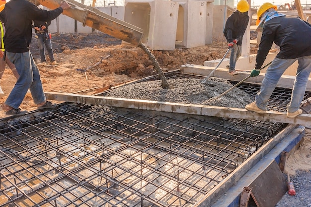 concrete-pouring-during-commercial-concreting-floors-buildings-construction-site_29285-1325