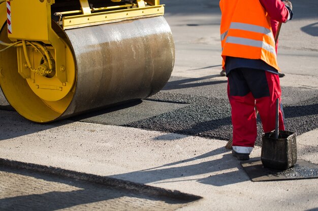 road-roller-compacting-asphalt_199620-6539